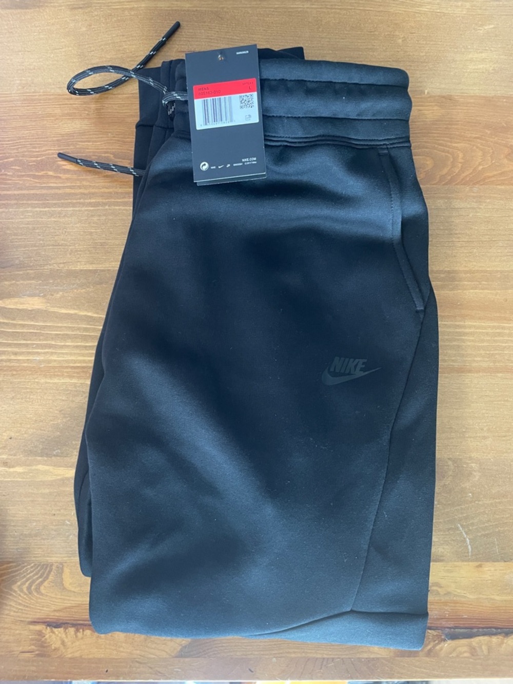 NIKE TECH SLIM FIT TAPER LEG SWEATPANTS